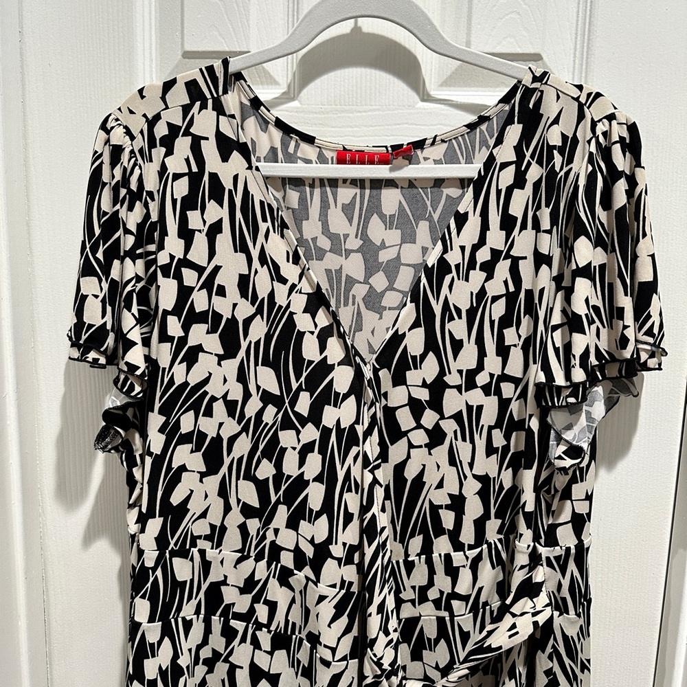Black and cream colored dress